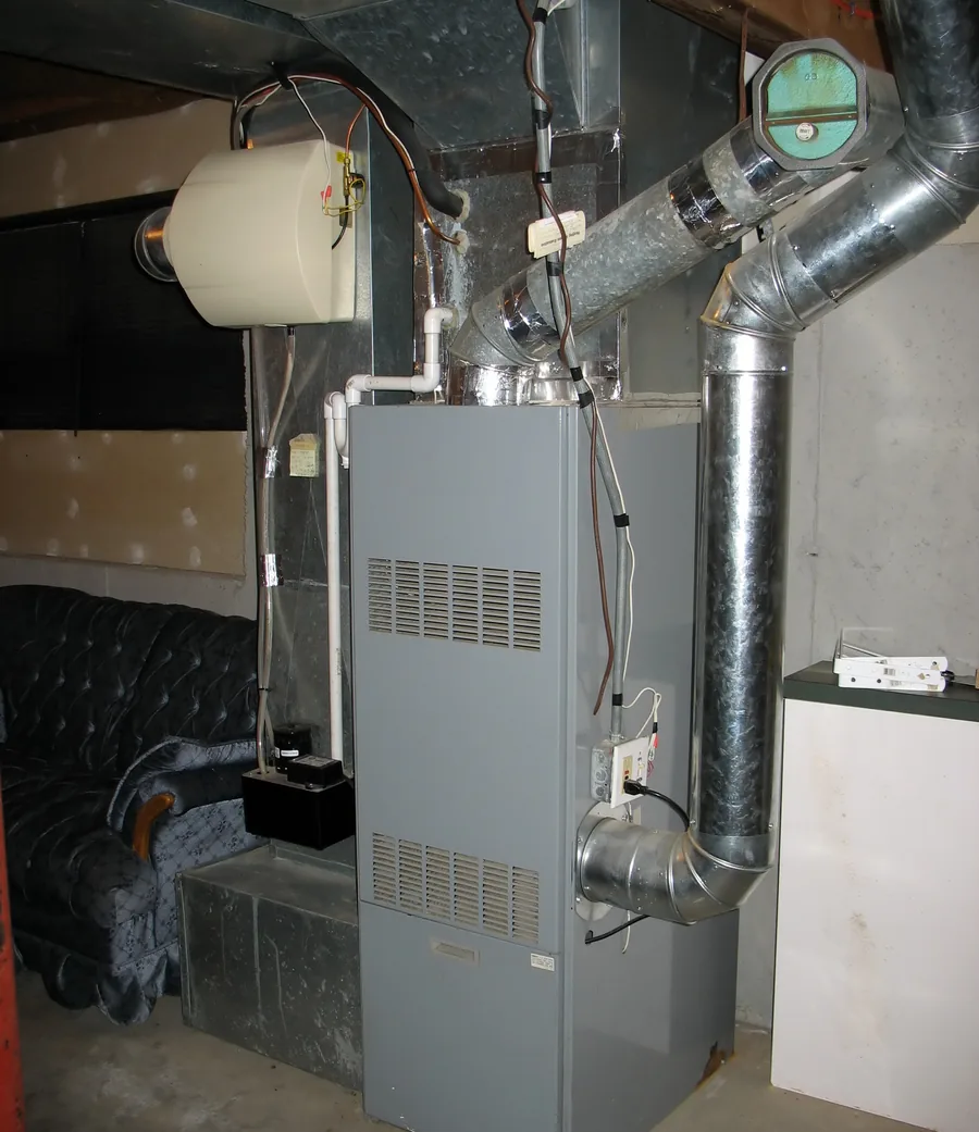 Gas furnace and ductwork in a home utility room