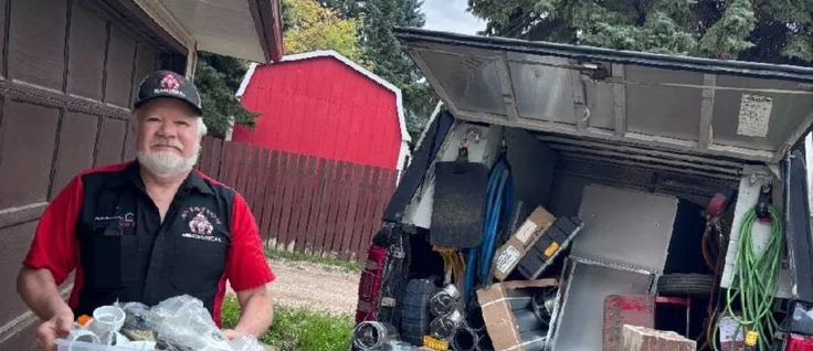 Aviation Mechanical owner loading parts from a fully stocked service truck in Saskatoon