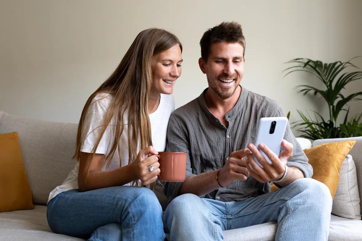 Couple reviewing options together at home