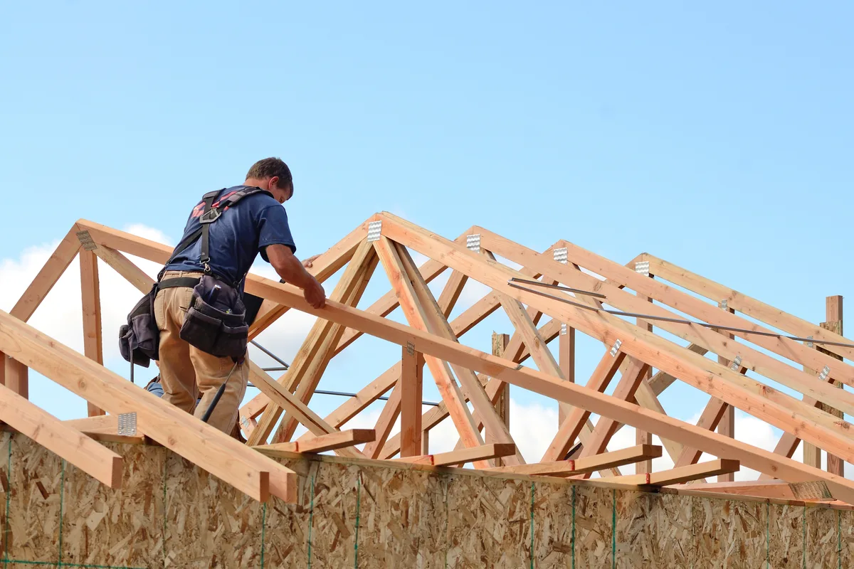 Roof trusses being installed on a new build